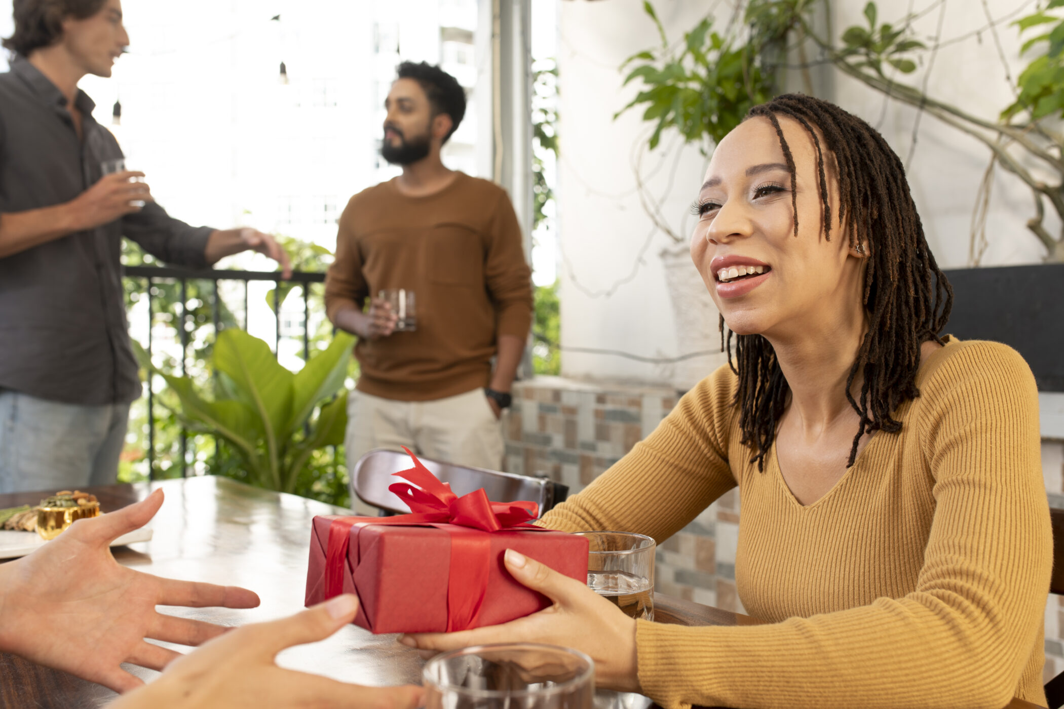 lady receiving gift at work